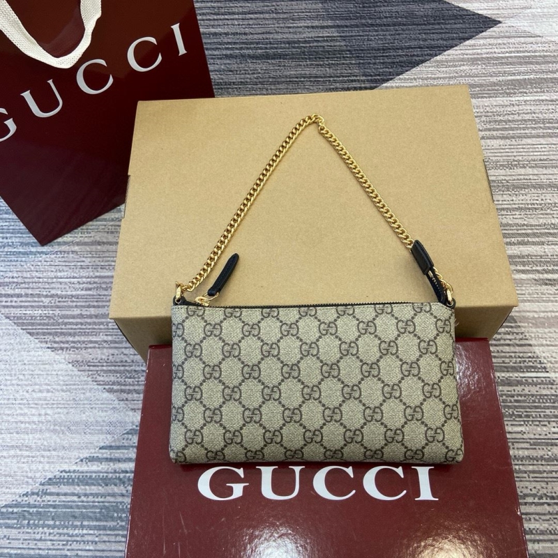 G*u*i top handle bags